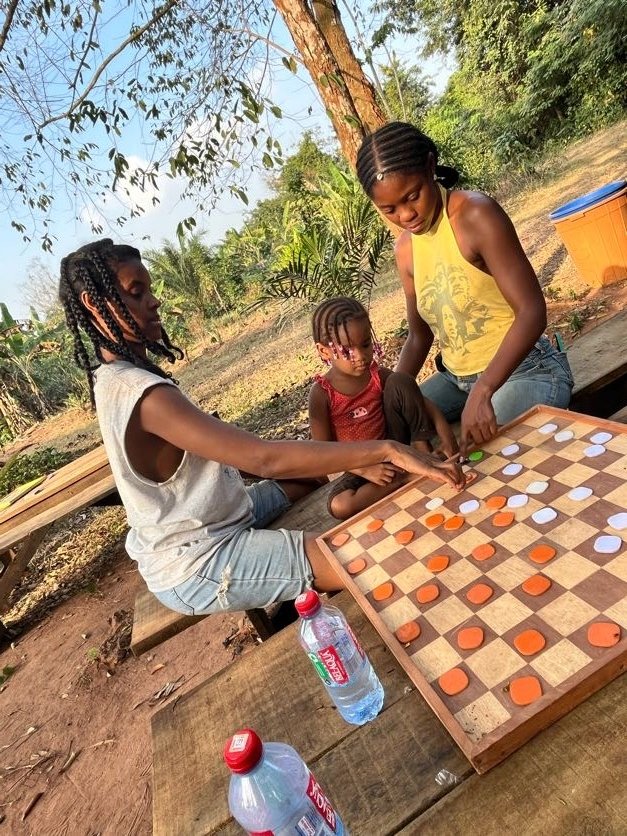 Guests playing a board game